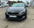 Черный Киа K5, объемом двигателя 2 л и пробегом 324 тыс. км за 9250 $, фото 1 на Automoto.ua