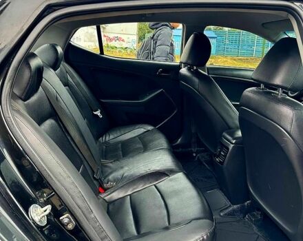 Черный Киа K5, объемом двигателя 2 л и пробегом 324 тыс. км за 9250 $, фото 2 на Automoto.ua