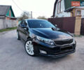 Черный Киа K5, объемом двигателя 2 л и пробегом 200 тыс. км за 9200 $, фото 1 на Automoto.ua