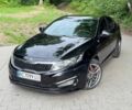 Черный Киа K5, объемом двигателя 2 л и пробегом 274 тыс. км за 9000 $, фото 1 на Automoto.ua
