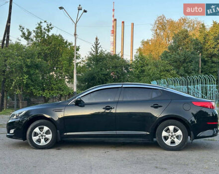 Черный Киа K5, объемом двигателя 2 л и пробегом 136 тыс. км за 8600 $, фото 3 на Automoto.ua