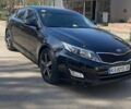 Черный Киа K5, объемом двигателя 2 л и пробегом 471 тыс. км за 7555 $, фото 1 на Automoto.ua