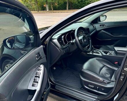 Черный Киа K5, объемом двигателя 2 л и пробегом 324 тыс. км за 9250 $, фото 3 на Automoto.ua