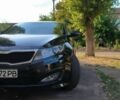 Черный Киа K5, объемом двигателя 2 л и пробегом 195 тыс. км за 7300 $, фото 1 на Automoto.ua