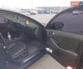 Черный Киа K5, объемом двигателя 2 л и пробегом 281 тыс. км за 11200 $, фото 15 на Automoto.ua