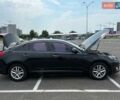 Черный Киа K5, объемом двигателя 2 л и пробегом 220 тыс. км за 10500 $, фото 1 на Automoto.ua