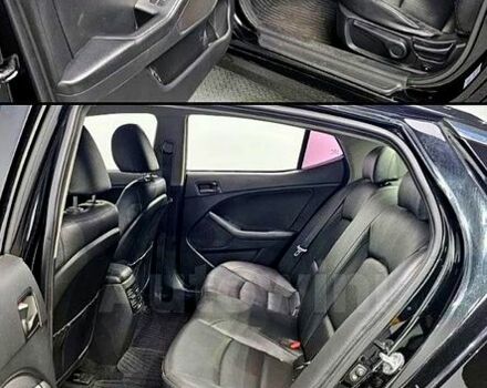 Черный Киа K5, объемом двигателя 2 л и пробегом 130 тыс. км за 12500 $, фото 3 на Automoto.ua