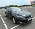 Черный Киа K5, объемом двигателя 2 л и пробегом 220 тыс. км за 10500 $, фото 1 на Automoto.ua