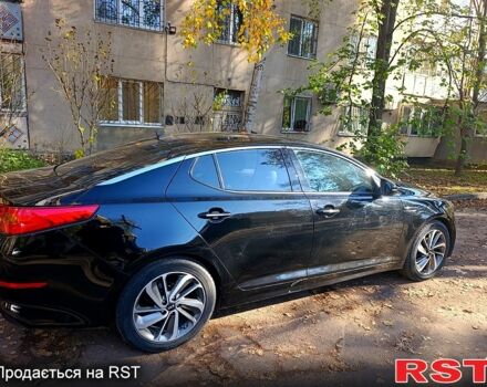 Черный Киа K5, объемом двигателя 2 л и пробегом 131 тыс. км за 12000 $, фото 4 на Automoto.ua