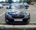 Черный Киа K5, объемом двигателя 2 л и пробегом 165 тыс. км за 11500 $, фото 1 на Automoto.ua