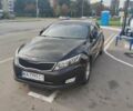 Черный Киа K5, объемом двигателя 2 л и пробегом 190 тыс. км за 12000 $, фото 1 на Automoto.ua