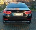 Черный Киа K5, объемом двигателя 2 л и пробегом 220 тыс. км за 8999 $, фото 1 на Automoto.ua