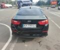 Черный Киа K5, объемом двигателя 2 л и пробегом 190 тыс. км за 12000 $, фото 3 на Automoto.ua