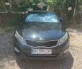 Черный Киа K5, объемом двигателя 2 л и пробегом 203 тыс. км за 10000 $, фото 1 на Automoto.ua