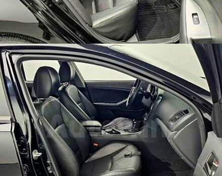 Черный Киа K5, объемом двигателя 2 л и пробегом 130 тыс. км за 12500 $, фото 4 на Automoto.ua