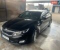 Черный Киа K5, объемом двигателя 2 л и пробегом 322 тыс. км за 9200 $, фото 1 на Automoto.ua
