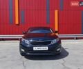 Черный Киа K5, объемом двигателя 2 л и пробегом 209 тыс. км за 11990 $, фото 2 на Automoto.ua