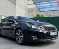 Черный Киа K5, объемом двигателя 2 л и пробегом 209 тыс. км за 9499 $, фото 1 на Automoto.ua