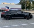 Черный Киа K5, объемом двигателя 2 л и пробегом 191 тыс. км за 9900 $, фото 1 на Automoto.ua
