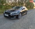 Черный Киа K5, объемом двигателя 2 л и пробегом 202 тыс. км за 8200 $, фото 1 на Automoto.ua