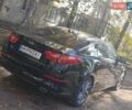 Черный Киа K5, объемом двигателя 2 л и пробегом 131 тыс. км за 12000 $, фото 4 на Automoto.ua