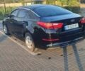 Чорний Кіа K5, об'ємом двигуна 2 л та пробігом 130 тис. км за 12500 $, фото 1 на Automoto.ua