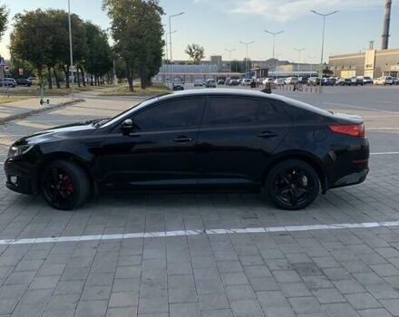 Черный Киа K5, объемом двигателя 2 л и пробегом 191 тыс. км за 9900 $, фото 3 на Automoto.ua