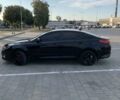 Черный Киа K5, объемом двигателя 2 л и пробегом 191 тыс. км за 9900 $, фото 3 на Automoto.ua