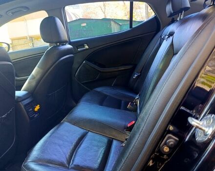 Черный Киа K5, объемом двигателя 2 л и пробегом 131 тыс. км за 12000 $, фото 3 на Automoto.ua