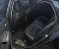 Черный Киа K5, объемом двигателя 2 л и пробегом 220 тыс. км за 12000 $, фото 7 на Automoto.ua
