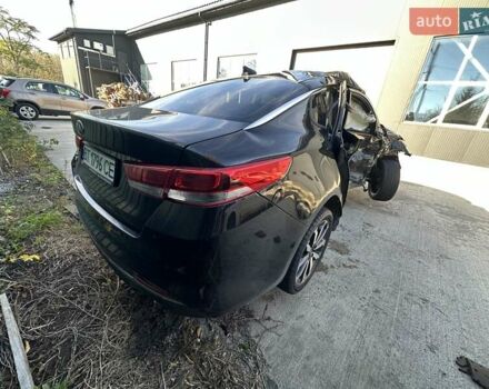 Черный Киа K5, объемом двигателя 2 л и пробегом 140 тыс. км за 5000 $, фото 6 на Automoto.ua