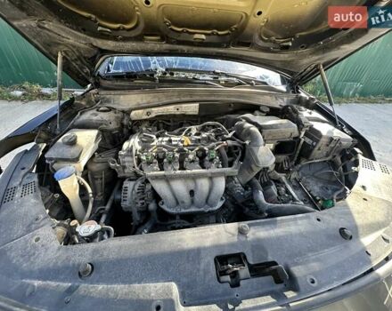 Черный Киа K5, объемом двигателя 2 л и пробегом 140 тыс. км за 5000 $, фото 35 на Automoto.ua