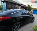 Черный Киа K5, объемом двигателя 2 л и пробегом 220 тыс. км за 12000 $, фото 3 на Automoto.ua