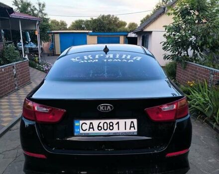 Черный Киа K5, объемом двигателя 2 л и пробегом 220 тыс. км за 12000 $, фото 2 на Automoto.ua