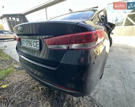 Черный Киа K5, объемом двигателя 2 л и пробегом 140 тыс. км за 5000 $, фото 7 на Automoto.ua