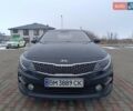 Черный Киа K5, объемом двигателя 2 л и пробегом 209 тыс. км за 11300 $, фото 1 на Automoto.ua