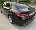 Черный Киа K5, объемом двигателя 2 л и пробегом 263 тыс. км за 11600 $, фото 6 на Automoto.ua