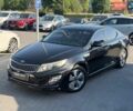 Черный Киа K5, объемом двигателя 2 л и пробегом 150 тыс. км за 13800 $, фото 1 на Automoto.ua