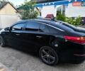 Черный Киа K5, объемом двигателя 2 л и пробегом 220 тыс. км за 12000 $, фото 4 на Automoto.ua