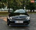 Чорний Кіа K5, об'ємом двигуна 2 л та пробігом 153 тис. км за 14400 $, фото 1 на Automoto.ua