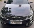 Черный Киа K5, объемом двигателя 2 л и пробегом 260 тыс. км за 12900 $, фото 1 на Automoto.ua