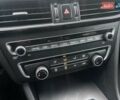 Черный Киа K5, объемом двигателя 1.7 л и пробегом 190 тыс. км за 12999 $, фото 25 на Automoto.ua