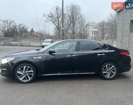 Черный Киа K5, объемом двигателя 2 л и пробегом 330 тыс. км за 10800 $, фото 1 на Automoto.ua