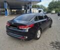 Черный Киа K5, объемом двигателя 2 л и пробегом 226 тыс. км за 12000 $, фото 2 на Automoto.ua