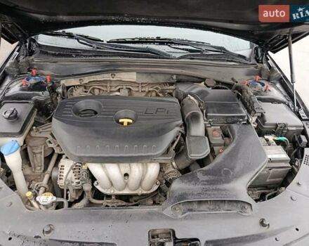 Чорний Кіа K5, об'ємом двигуна 2 л та пробігом 276 тис. км за 13200 $, фото 6 на Automoto.ua