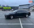 Черный Киа K5, объемом двигателя 2 л и пробегом 230 тыс. км за 13499 $, фото 1 на Automoto.ua