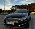 Черный Киа K5, объемом двигателя 2 л и пробегом 220 тыс. км за 11200 $, фото 1 на Automoto.ua
