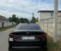 Чорний Кіа K5, об'ємом двигуна 2 л та пробігом 210 тис. км за 13700 $, фото 1 на Automoto.ua