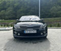 Черный Киа K5, объемом двигателя 2 л и пробегом 192 тыс. км за 12000 $, фото 1 на Automoto.ua