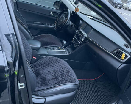 Черный Киа K5, объемом двигателя 2 л и пробегом 230 тыс. км за 13499 $, фото 7 на Automoto.ua
